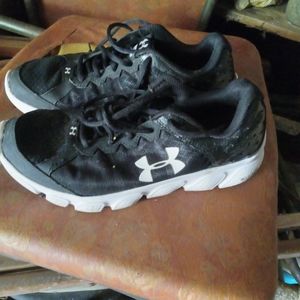 Under Armour tennis shoes.